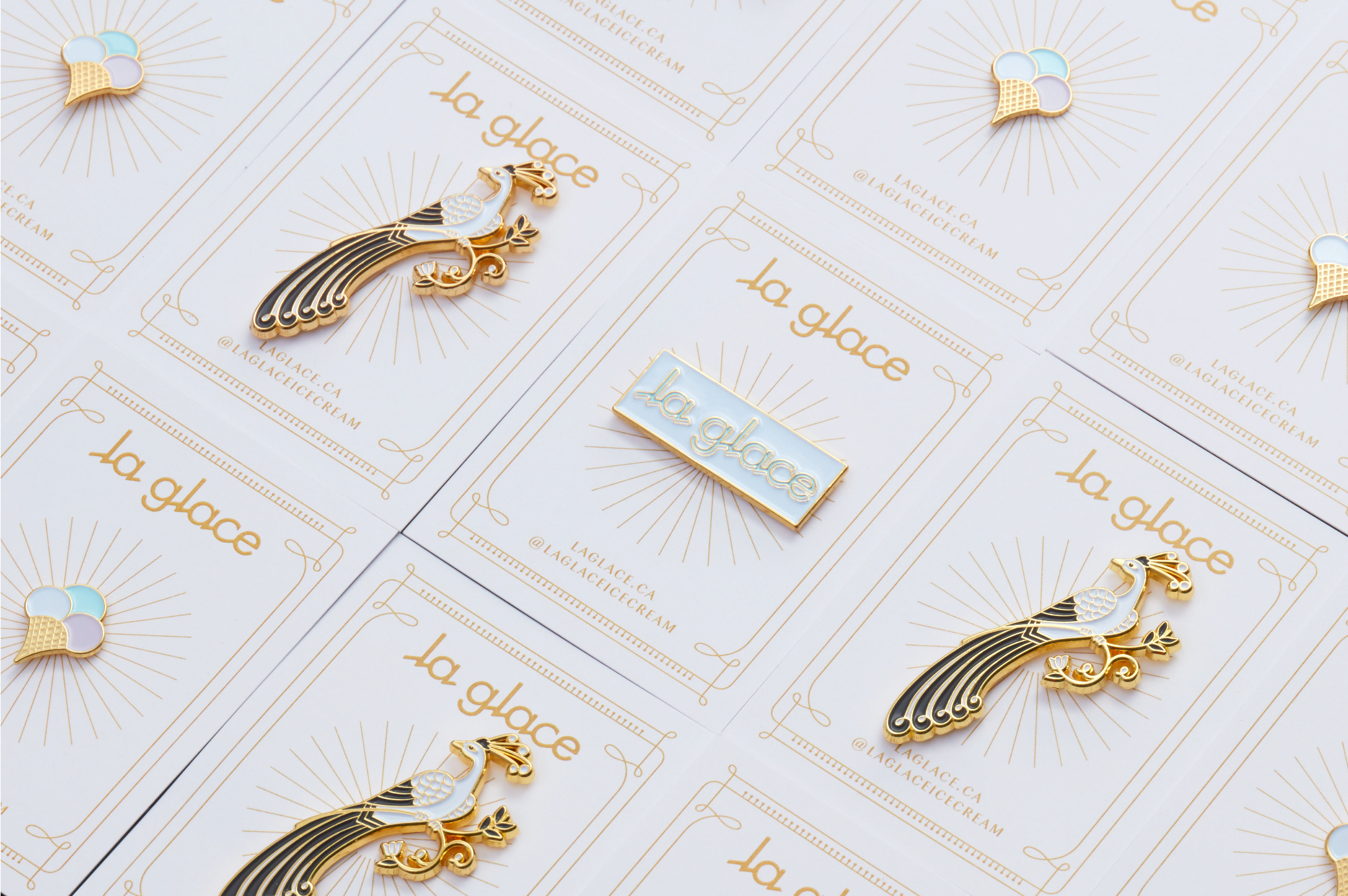 Custom branded enamel pins for La Glace ice cream shop. 