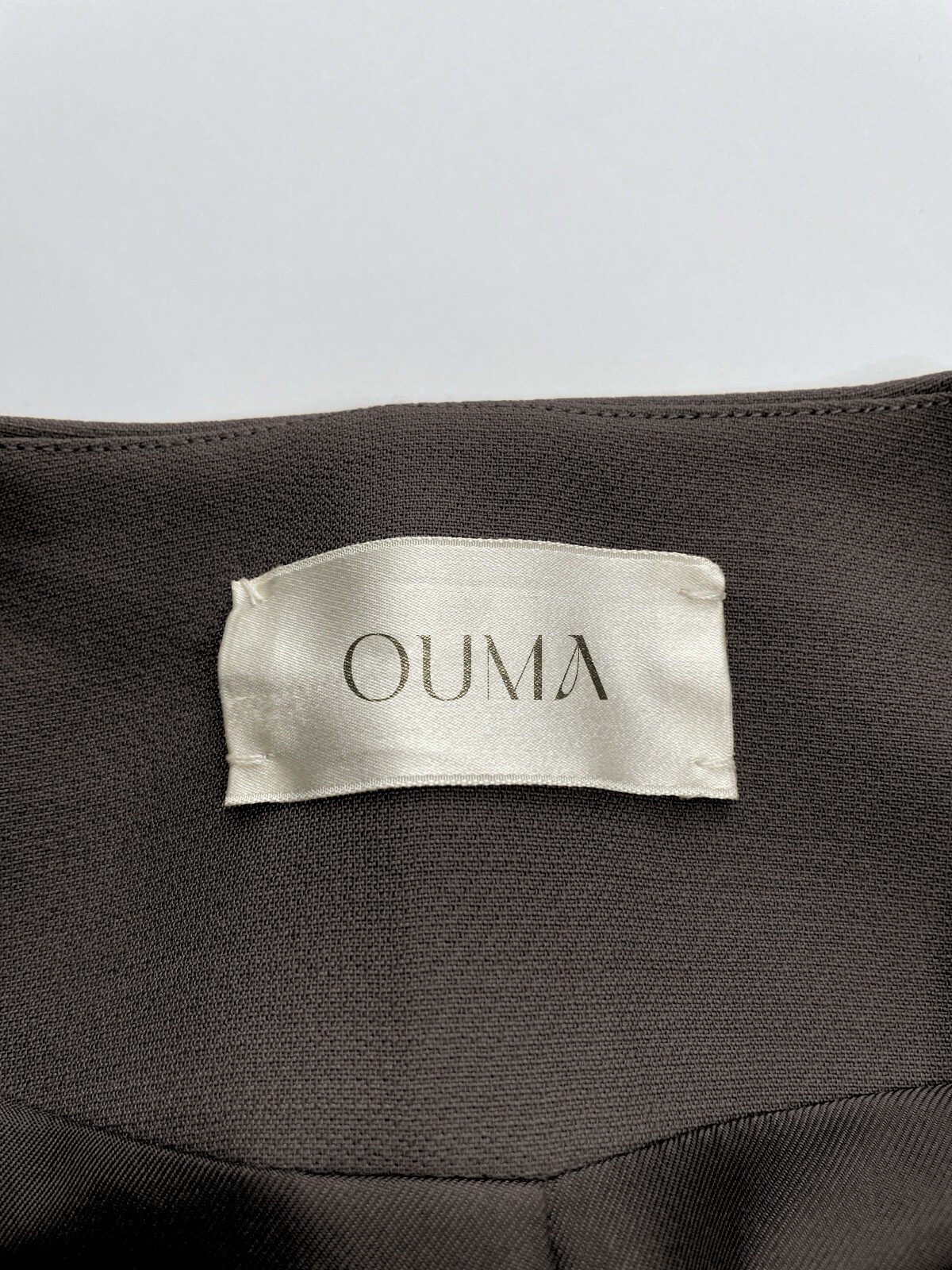 silk clothing tag designed for luxury brand strategy and design